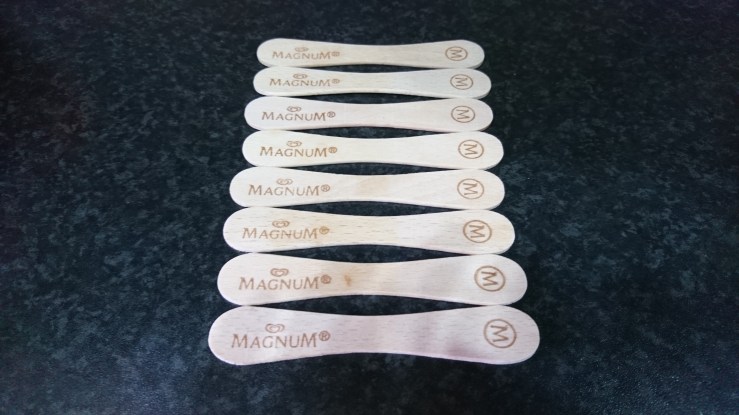 Ice cream sticks for labeling sunflowers.